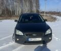 Серый Форд Фокус, объемом двигателя 1.8 л и пробегом 250 тыс. км за 4500 $, фото 2 на Automoto.ua