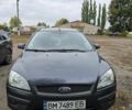 Серый Форд Фокус, объемом двигателя 1.8 л и пробегом 196 тыс. км за 4999 $, фото 2 на Automoto.ua