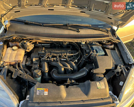 Серый Форд Фокус, объемом двигателя 1.6 л и пробегом 202 тыс. км за 4999 $, фото 14 на Automoto.ua