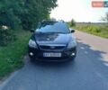 Серый Форд Фокус, объемом двигателя 1.6 л и пробегом 232 тыс. км за 5600 $, фото 20 на Automoto.ua