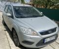 Серый Форд Фокус, объемом двигателя 1.8 л и пробегом 225 тыс. км за 3800 $, фото 1 на Automoto.ua