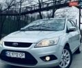 Сірий Форд Фокус, об'ємом двигуна 1.56 л та пробігом 199 тис. км за 4950 $, фото 1 на Automoto.ua