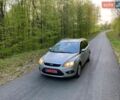 Сірий Форд Фокус, об'ємом двигуна 2 л та пробігом 229 тис. км за 5699 $, фото 1 на Automoto.ua
