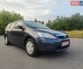 Серый Форд Фокус, объемом двигателя 1.6 л и пробегом 240 тыс. км за 5850 $, фото 3 на Automoto.ua