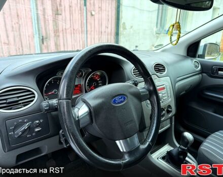 Серый Форд Фокус, объемом двигателя 1.6 л и пробегом 179 тыс. км за 5800 $, фото 12 на Automoto.ua