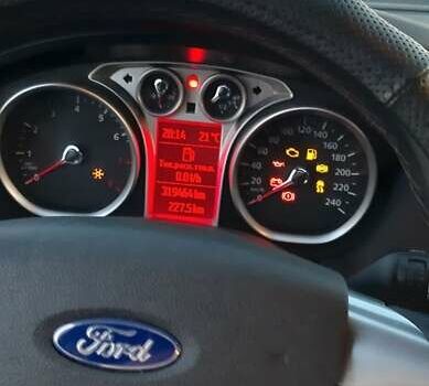 Серый Форд Фокус, объемом двигателя 1.8 л и пробегом 318 тыс. км за 5500 $, фото 13 на Automoto.ua