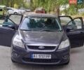 Серый Форд Фокус, объемом двигателя 1.6 л и пробегом 322 тыс. км за 4800 $, фото 7 на Automoto.ua