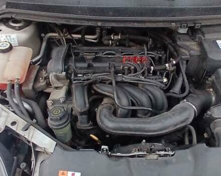 Серый Форд Фокус, объемом двигателя 1.6 л и пробегом 242 тыс. км за 5900 $, фото 14 на Automoto.ua