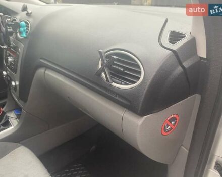 Серый Форд Фокус, объемом двигателя 1.8 л и пробегом 299 тыс. км за 6900 $, фото 16 на Automoto.ua