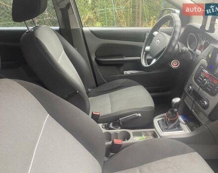 Серый Форд Фокус, объемом двигателя 1.8 л и пробегом 299 тыс. км за 6900 $, фото 18 на Automoto.ua