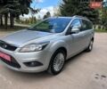 Серый Форд Фокус, объемом двигателя 1.8 л и пробегом 211 тыс. км за 6350 $, фото 2 на Automoto.ua