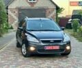 Серый Форд Фокус, объемом двигателя 1.6 л и пробегом 247 тыс. км за 6550 $, фото 1 на Automoto.ua