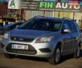 Серый Форд Фокус, объемом двигателя 1.6 л и пробегом 253 тыс. км за 5100 $, фото 1 на Automoto.ua