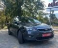 Серый Форд Фокус, объемом двигателя 1.6 л и пробегом 220 тыс. км за 4950 $, фото 1 на Automoto.ua