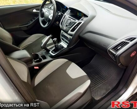 Форд Фокус 2013 в Вознесенске на Automoto.ua Серый Форд Фокус, объемом двигателя 1 л и пробегом 133 тыс. км за 6600 $, фото 7 на Automoto.ua