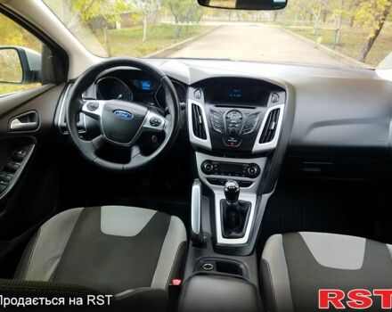 Форд Фокус 2013 в Вознесенске на Automoto.ua Серый Форд Фокус, объемом двигателя 1 л и пробегом 133 тыс. км за 6600 $, фото 9 на Automoto.ua
