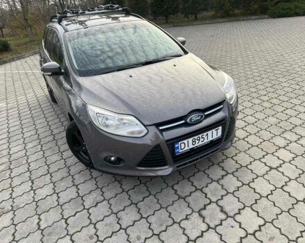 Сірий Форд Фокус, об'ємом двигуна 1 л та пробігом 213 тис. км за 6600 $, фото 17 на Automoto.ua