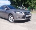 Сірий Форд Фокус, об'ємом двигуна 1 л та пробігом 183 тис. км за 6200 $, фото 1 на Automoto.ua