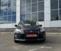 Сірий Форд Фокус, об'ємом двигуна 1.6 л та пробігом 265 тис. км за 8999 $, фото 1 на Automoto.ua