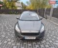 Сірий Форд Фокус, об'ємом двигуна 1.5 л та пробігом 248 тис. км за 9100 $, фото 1 на Automoto.ua