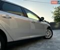 Серый Форд Фокус, объемом двигателя 1.5 л и пробегом 223 тыс. км за 8450 $, фото 54 на Automoto.ua