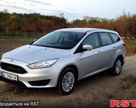 Форд Фокус 2015 у Белой Церкве на Automoto.ua Сірий Форд Фокус, об'ємом двигуна 1.5 л та пробігом 173 тис. км за 8400 $, фото 1 на Automoto.ua