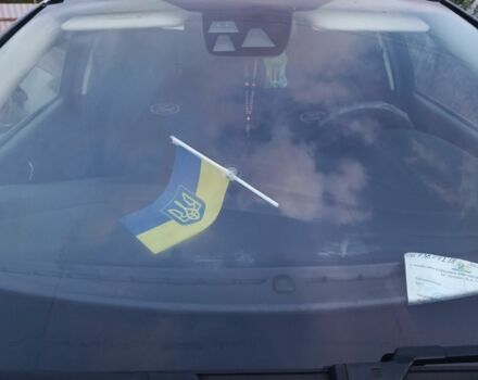 Серый Форд Фокус, объемом двигателя 1.5 л и пробегом 240 тыс. км за 8500 $, фото 2 на Automoto.ua