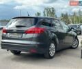 Сірий Форд Фокус, об'ємом двигуна 1.5 л та пробігом 210 тис. км за 7800 $, фото 1 на Automoto.ua