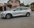 Сірий Форд Фокус, об'ємом двигуна 2 л та пробігом 242 тис. км за 12494 $, фото 3 на Automoto.ua