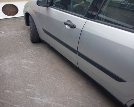 Серый Форд Фокус, объемом двигателя 1.8 л и пробегом 398 тыс. км за 1050 $, фото 1 на Automoto.ua