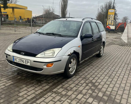 Серый Форд Фокус, объемом двигателя 1.8 л и пробегом 280 тыс. км за 1300 $, фото 1 на Automoto.ua