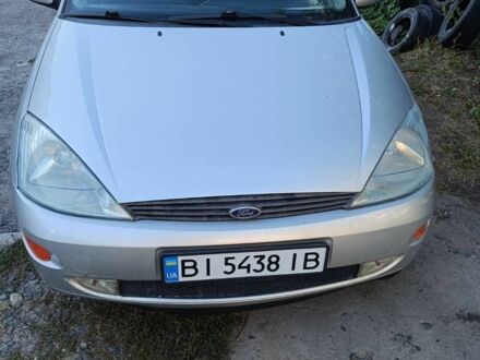Серый Форд Фокус, объемом двигателя 1.8 л и пробегом 295 тыс. км за 2850 $, фото 1 на Automoto.ua