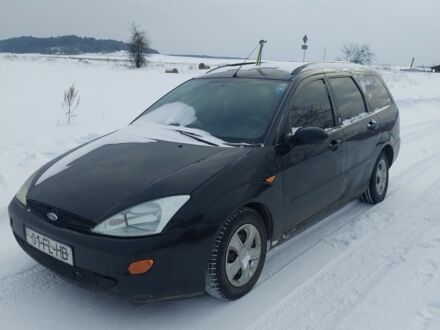 Серый Форд Фокус, объемом двигателя 1.8 л и пробегом 250 тыс. км за 950 $, фото 1 на Automoto.ua