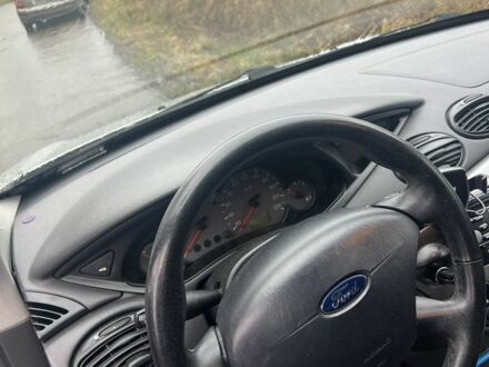 Серый Форд Фокус, объемом двигателя 1.8 л и пробегом 315 тыс. км за 468 $, фото 1 на Automoto.ua