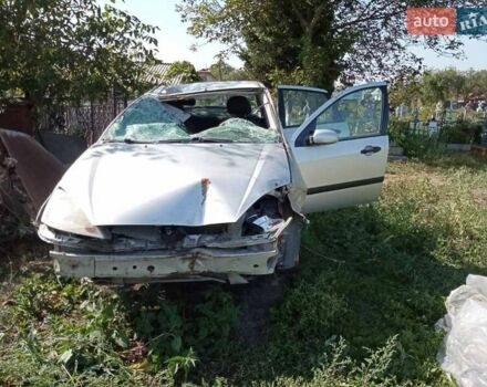 Серый Форд Фокус, объемом двигателя 1.8 л и пробегом 290 тыс. км за 1000 $, фото 1 на Automoto.ua