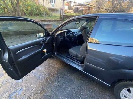 Серый Форд Фокус, объемом двигателя 1.8 л и пробегом 327 тыс. км за 3500 $, фото 1 на Automoto.ua