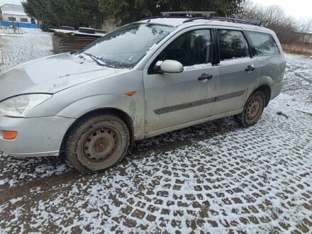 Серый Форд Фокус, объемом двигателя 1.8 л и пробегом 240 тыс. км за 1350 $, фото 1 на Automoto.ua