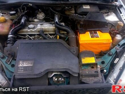Серый Форд Фокус, объемом двигателя 1.8 л и пробегом 165 тыс. км за 1800 $, фото 1 на Automoto.ua
