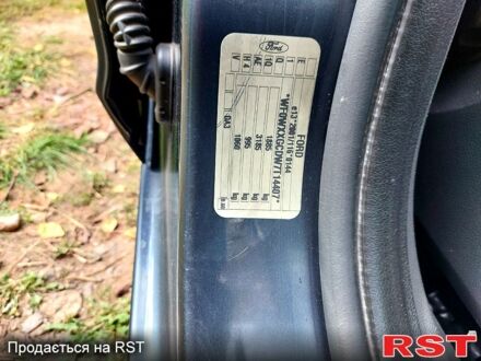 Серый Форд Фокус, объемом двигателя 1.6 л и пробегом 258 тыс. км за 4500 $, фото 1 на Automoto.ua