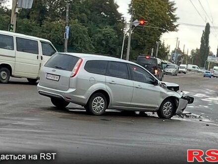 Серый Форд Фокус, объемом двигателя 1.8 л и пробегом 225 тыс. км за 1500 $, фото 1 на Automoto.ua