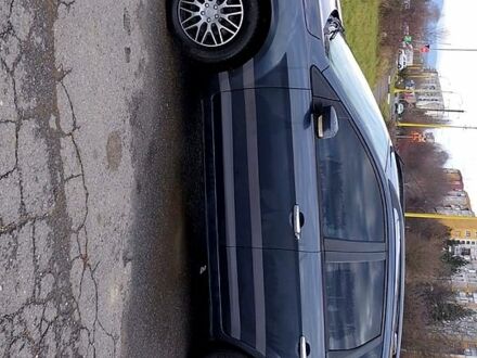 Серый Форд Фокус, объемом двигателя 1.6 л и пробегом 305 тыс. км за 5200 $, фото 1 на Automoto.ua