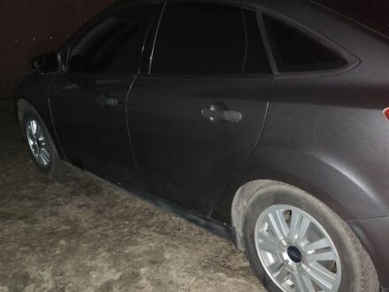 Сірий Форд Фокус, об'ємом двигуна 2 л та пробігом 180 тис. км за 6499 $, фото 1 на Automoto.ua
