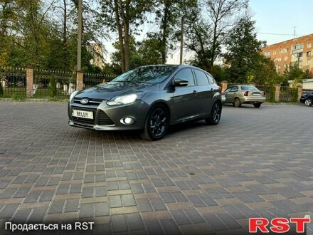 Форд Фокус 2014 у Валках на Automoto.ua Сірий Форд Фокус, об'ємом двигуна 2 л та пробігом 218 тис. км за 6999 $, фото 1 на Automoto.ua