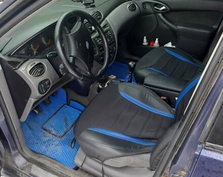 Синий Форд Фокус, объемом двигателя 1.8 л и пробегом 226 тыс. км за 3500 $, фото 5 на Automoto.ua
