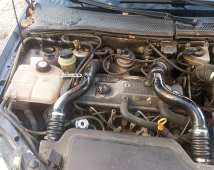 Синий Форд Фокус, объемом двигателя 1.8 л и пробегом 250 тыс. км за 1850 $, фото 6 на Automoto.ua