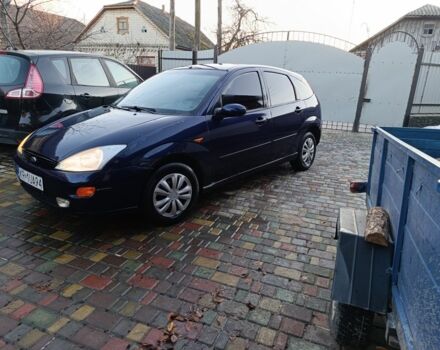 Синий Форд Фокус, объемом двигателя 1.8 л и пробегом 250 тыс. км за 950 $, фото 1 на Automoto.ua