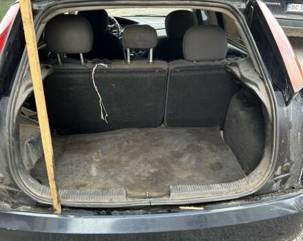 Синий Форд Фокус, объемом двигателя 1.8 л и пробегом 380 тыс. км за 850 $, фото 12 на Automoto.ua