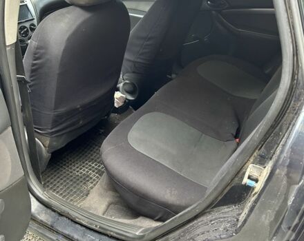 Синий Форд Фокус, объемом двигателя 1.8 л и пробегом 380 тыс. км за 850 $, фото 11 на Automoto.ua