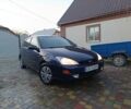 Синий Форд Фокус, объемом двигателя 1.8 л и пробегом 250 тыс. км за 950 $, фото 1 на Automoto.ua