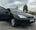 Синий Форд Фокус, объемом двигателя 1.4 л и пробегом 300 тыс. км за 3400 $, фото 6 на Automoto.ua